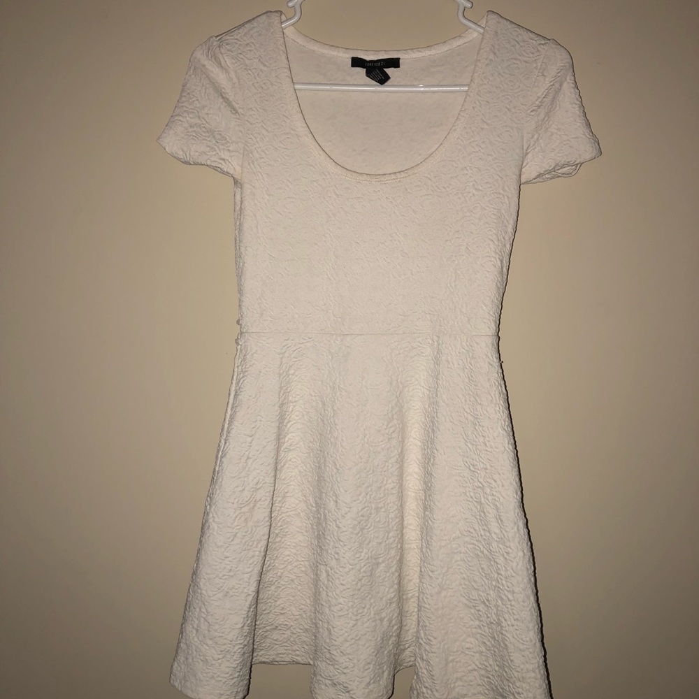 White skater dress with rose details